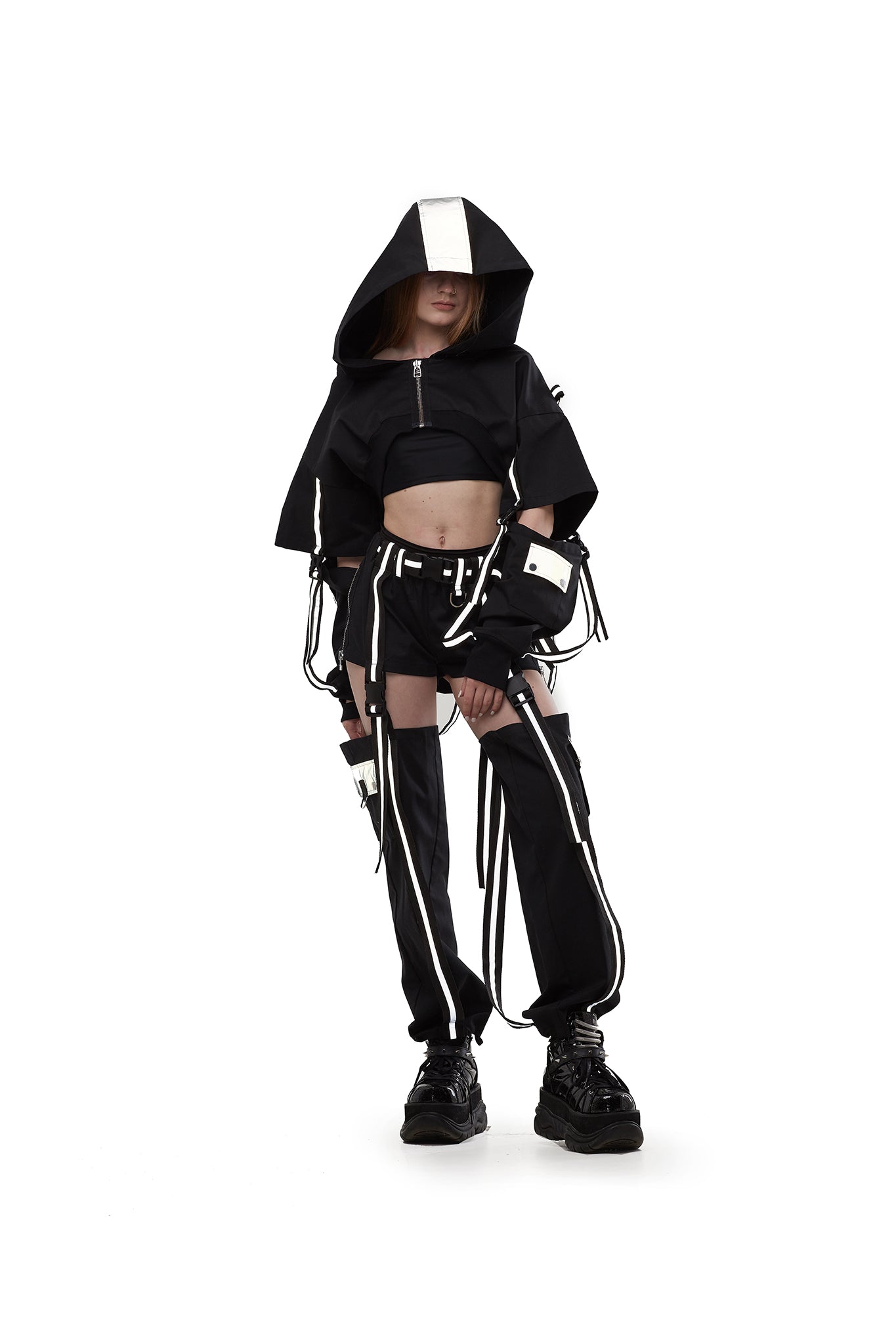 Hooded shrug in Black with reflective straps.